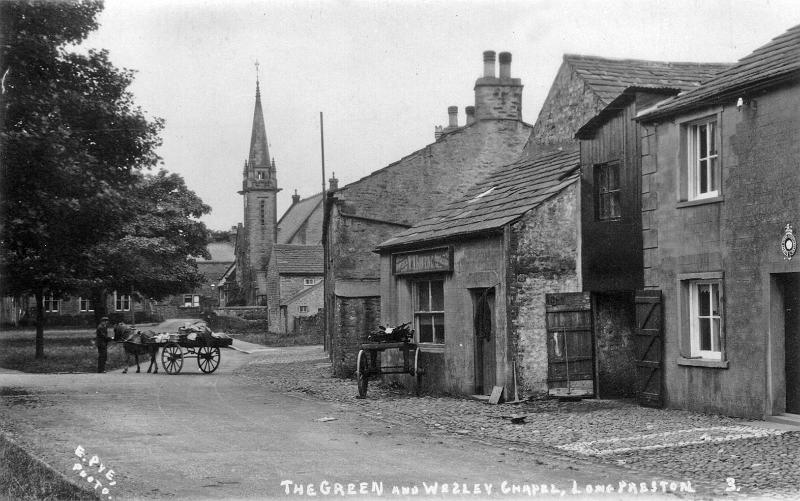 The Green and Wesley Chapel.JPG - The Green and Wesleyan Chapel, with Bowring's shop in centre of picture. Note the Constabulary Sign over the door on the extreme right.  - see next picture  Constabulary Sign  for a closeup.  ( Does anyone know the date? )  